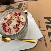 Vegan tiramisu with pomegranate seeds and coconut flakes   at Wolke in Vienna