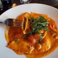 Ravioli filled with figs and nuts in tomato sauce with vegan cream (13.90€) at Gioia in Dusseldorf