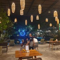 Restaurant overlooking the swimming pool at Titi Batu in Ubud