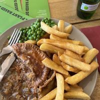 Vegan minted lamb pie with chips, peas and gravy  at VK Plant Based Diner in Waterlooville