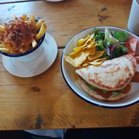 'Fishless' finger flatbread and dirty fries. Delicious! at VK Plant Based Diner in Waterlooville