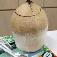 Fresh aromatic (fragrance) coconut at CocoCane - Lot One in West Singapore