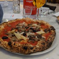 Pizza capriciosa with vegan cheese at Rossopomodoro in Copenhagen