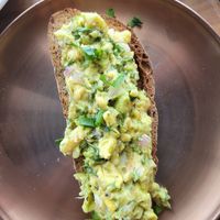 sourdough slice with guacamole at Fit Choices in Cartagena