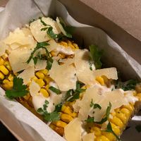 Vegetarian corn ribs with truffle and Parmesan shavings for my fella at Leon in Cobham