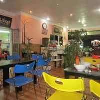 There is plenty of room in the second room of the restaurant at An Lac Tam - P2 in Da Lat