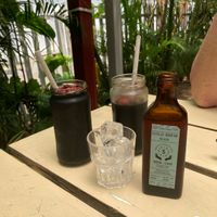 Cold brew coffee and black magic pressed juice (activated charcoal, coconut water and pineapple juice)   at Seed Cafe in Colombo