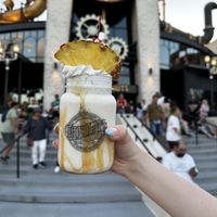 Vegan pineapple upside down cake, brown sugar, caramel, pineapples, oatmilk whipped topping  at Universal Studios - The Toothsome Chocolate Emporium & Savory Feast Kitchen in Orlando
