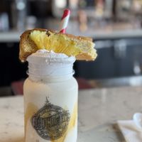 Right Side Up pineapple vegan milkshake  at Universal Studios - The Toothsome Chocolate Emporium & Savory Feast Kitchen in Orlando