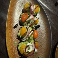 The avocado bruschetta was delicious too and even had vegan feta   at Universal Studios - The Toothsome Chocolate Emporium & Savory Feast Kitchen in Orlando