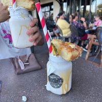 Upside down pineapple milkshake   at Universal Studios - The Toothsome Chocolate Emporium & Savory Feast Kitchen in Orlando