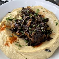 Hummus bowl w onions + mushrooms  at Artcaffé in Nairobi