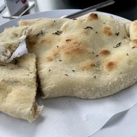 Focaccia bread served w hummus  at Artcaffé in Nairobi
