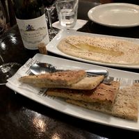 Hummus appetizer with wine.   at Entrevinos in Carolina