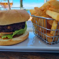 Burger and super crunchy fries at Tathra Hotel in Tathra