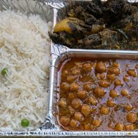 Rice with peas, spinach and potatoes, chickpeas  at Shalimar in Milan