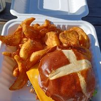 Jalapeño peppercrusted burger with fries. at The Mocking Bird in Beaverton