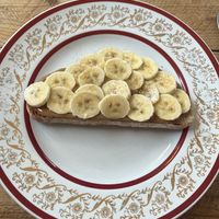 Almond butter on sourdough with maple syrup and banana    at Earthlings in Newcastle Upon Tyne