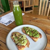 My breakfast. Avocado toast on homemade lentil bread and the Pure Green juice. Absolutely delicious!!  at Earthlings in Newcastle Upon Tyne