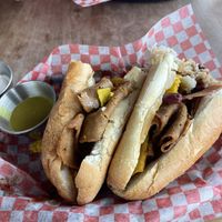 Breakfast sandwich which came with eggs, egg yolk, ham, mayonnaise and tomato’s. (The eggs, egg yolk, and ham are made in house and very good)  at Frenchmen Street Food in Gainesville