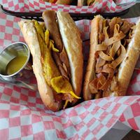 Breakfast Po'Boy With Vegan Egg Dip (on the left) and Cajun Tofu Po'Boy (on the right) at Frenchmen Street Food in Gainesville