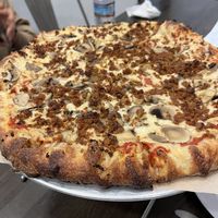 Vegan sausage and mushroom pizza  at Pizza Uncommon in West Lafayette