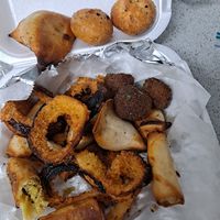 I'm not sure what the circular dark brown things were but they were extremely dry and tasted like they absorbed flavor from the inside of a refrigerator at Naan Boti Chai Shai in St Petersburg