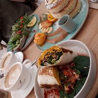 breakfast burrito, pancakes with fruit & ice cream, avocadobread at Good One Café in Hamburg