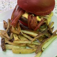 Hamburguesa 0% animal con cheddar, cebolla, bacon   at Liberación Comida Vegana in Buenos Aires
