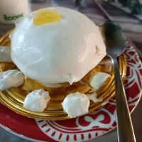 Desiderio, a dessert with a strong and lovely lemon flavour, a creamy outer layer, sponge cake and an heart of lemon cream at Romeo Peluso in Pompei