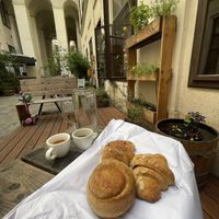 1 chocolate vegan croissant, 1 almond vegan croissant, 1 vegan bread cinnamon roll, two espresso and a nice glass of fresh tap water!  at Schwarzbrot OG in Vienna