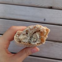 this one was like a small baguette but filled with something with the taste of elsässer flammkuchen at Schwarzbrot OG in Vienna