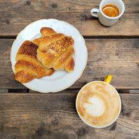 vegan croissants with nougat and marzipan, coffee with oat milk at Schwarzbrot OG in Vienna