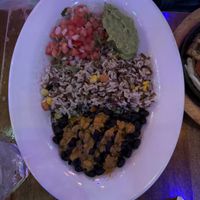 Side is brown rice and beans, pico de gallo and guacamole   at Mexico Autentico in Brooklyn
