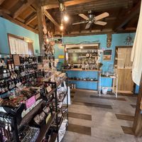 The service window and inside the cafe  at Koya - こや in Yomitan