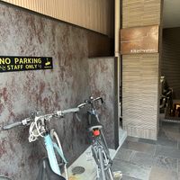 Entrance is down these stairs. The door is at the end of the hallway    at Vegginy in Kyoto