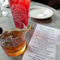 Tasty Manhattan and cranberry hibiscus juice at Bar Vegan in Albany