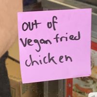 Homemade sign announcing out of vegan fried chicken:-(  at Ike's in Carson