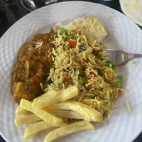 Veg chuleta with vegetable rice  at Curry 'n' Grill House in Tenerife