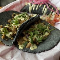 Cilantro Limon Tacos with an Elote Empanada.   at Mis Tacones in Portland