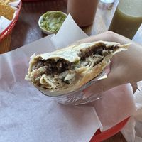 asada burrito (8/10) - $13😄 at Mis Tacones in Portland