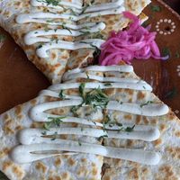 Al Pastor Quesadilla: More protein, less cheesy than typical tex-mex, great flavors. Pickled onions on side.   at Mis Tacones in Portland