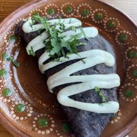 Elote empanada 😋 Not pictured: Chips n guac, perfectly seasoned. Love these plates!   at Mis Tacones in Portland