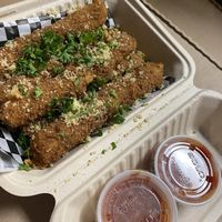 Mozzarella sticks with marinara to dip at Secret Vegan Pizza in Los Angeles