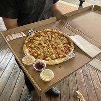 Bacon and pineapple pizza vegan gluten-free at Secret Vegan Pizza in Los Angeles