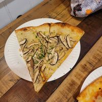Mushroom slice at Secret Vegan Pizza in Los Angeles