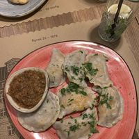 Boiled poerogy with cabbage, lentil, carrot, zucchini and onion.   at Pierogarnia Rynek 26 in Wroclaw