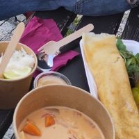 Bad picture, I know. But shows red Thai curry with rice and dosa menu with potatoes and chutney. at Dosa Dosa in Prague