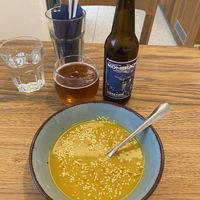 Sweet potato soup and a kombucha  at Dosa Dosa in Prague