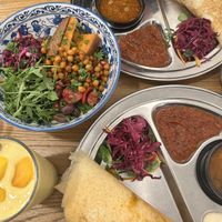 Mushroom dosa, potato dosa, hummus bowl and mango lassi  at Dosa Dosa in Prague